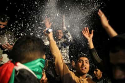 Image for Gazans shed tears of joy, disbelief at news of ceasefire deal