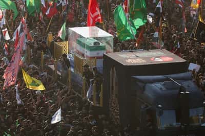 Image for Thousands march as Khamenei's funeral procession crosses into Iraq