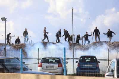 Image for Greek farmers block borders, airport and roads in protest at delayed EU funds