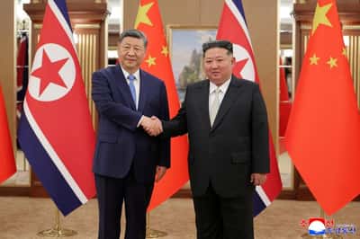 Image for Analysis-North Korea, China claim wins from Xi visit, but limits remain