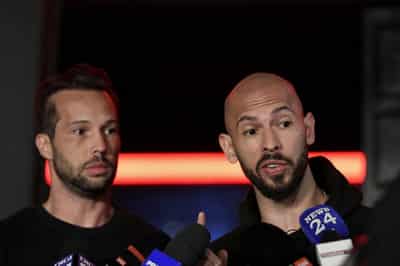 Image for Tate brothers will return to UK to face charges after Romanian legal proceedings, lawyers say