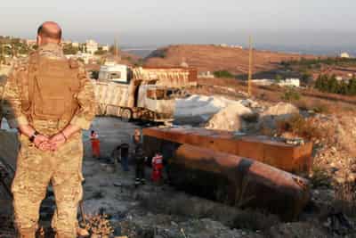 Image for President hopes for Lebanon government in days as crisis bites deeper