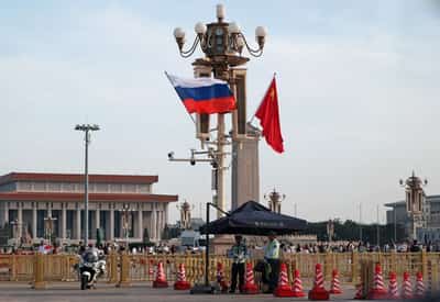 Image for Putin says Russia-China ties at unprecedented level, invites Xi to Russia