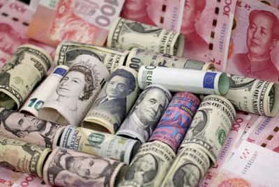 Image for Dollar rebounds as White House seeks to ease tensions over Fed, China trade