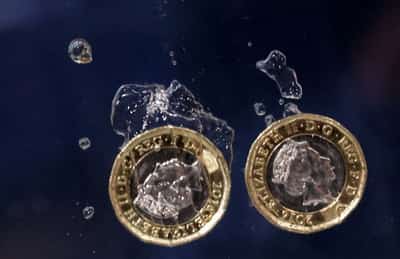 Image for Sterling edges lower, BoE's Bailey signals no rush to raise rates