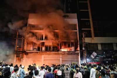 Image for Bangladesh government urges calm in wake of youth leader's killing, as election looms