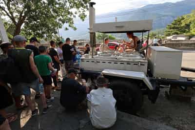 Image for Crimean families queue for hot meals as Ukraine hits power supply