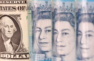 Image for Pound touches four-month high against weaker dollar