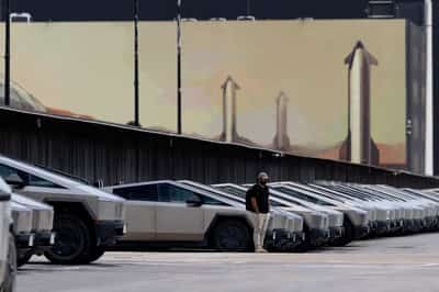 Image for Analysis-How a merged SpaceX-Tesla might navigate its China problem