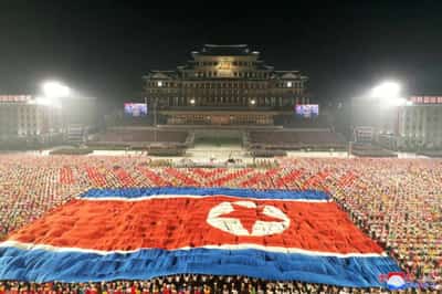 Image for N.Korea puts hazmat suits on parade for national day, but no missiles