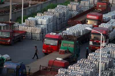 Image for China aluminium sector must shut inefficient coal power to meet climate goals &#8211; report