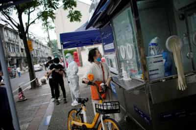 Image for In Shanghai, lockdown blues make way for COVID testing gripes
