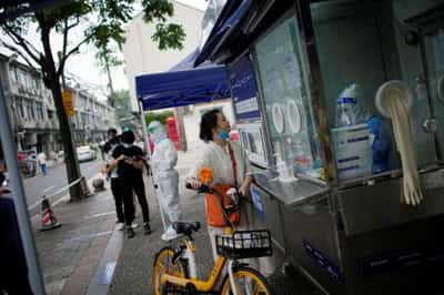 Image for In Shanghai, lockdown blues make way for COVID testing gripes