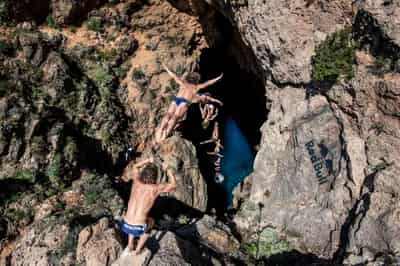 Image for Cliff divers set out on quest to conquer Ibiza&#8217;s &#8216;Cave of Light&#8217;