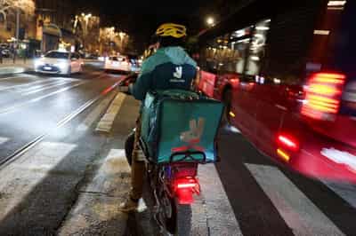 Image for Deliveroo's Italian arm to pay workers 40% more after labour exploitation probe