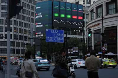 Image for Asian shares rise, dollar dips ahead of Fed policy decision