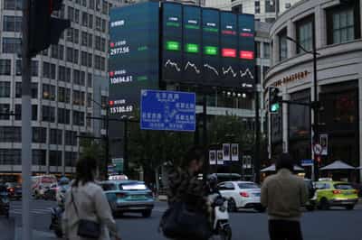 Image for Asian shares rise, dollar dips ahead of Fed policy decision