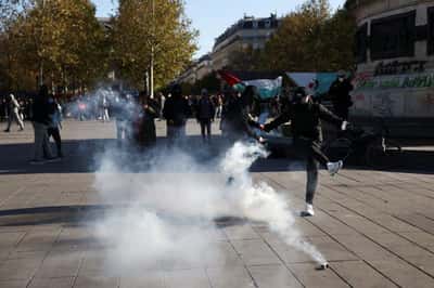 Image for French markets tumble as riots add to political crisis 