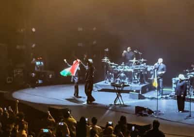 Image for Massive Attack band says Singapore police detained, questioned them after concert
