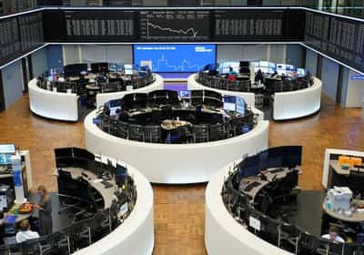 Image for European shares settle lower as investors gauge mixed earnings, EU-US trade progress