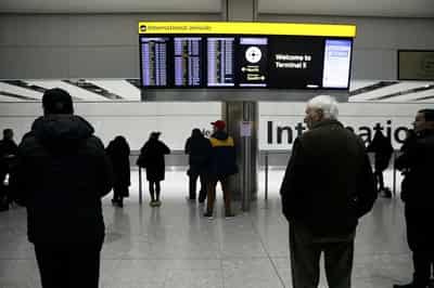 Image for Business travel emissions drop as many firms fly less -survey