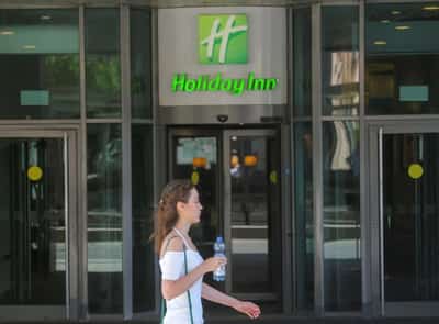 Image for Holiday Inn owner IHG's $900 million share buyback disappoints, shares fall