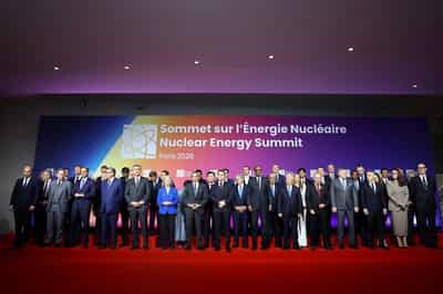 Image for Greenpeace activists storm stage at France's nuclear summit, confront Macron