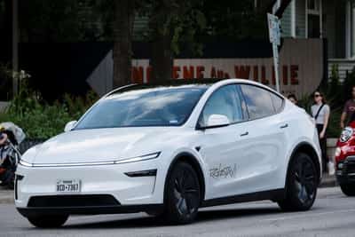 Image for How does Tesla get to $8.5 trillion value? Robots, robotaxis and hope