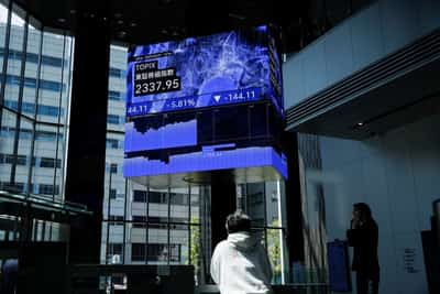 Image for Stocks climb to record, gilt yields surge on finance minister uncertainty