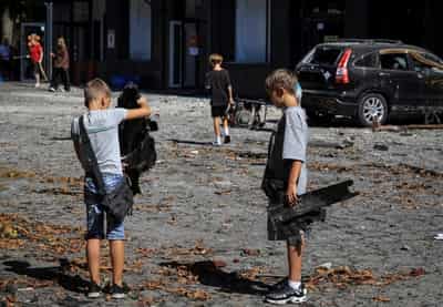 Image for Russian attacks kill 10, injure dozens in Ukraine; Russia says it hits ships, plants