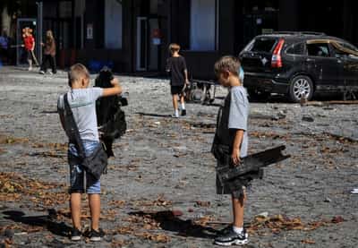 Image for Russian attacks kill six, injure dozens in Ukraine, Moscow says it hits ships, plants