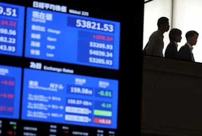Image for Asia shares mixed, oil advances on US-Iran deadlock