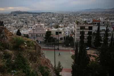 Image for Fitch lifts Greece's rating on strong fiscal position