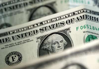 Image for Dollar mixed on tariff uncertainty, headed for monthly gain against yen