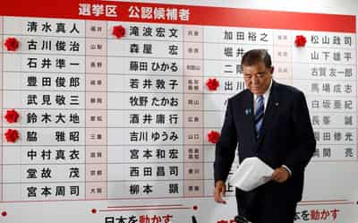Image for Japan PM Ishiba vows to stay on after bruising election defeat