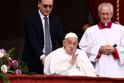 Image for Pope Francis greets cheering Easter crowds from popemobile as he recovers from pneumonia