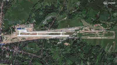 Image for Exclusive-Attack aircraft, military vehicles visible at new China-Laos base, satellite images show