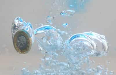Image for Sterling treads water as data paints sombre picture before budget