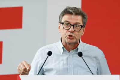 Image for Italy to shed residual stakes in banks, economy minister says