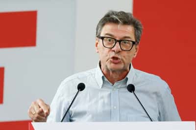 Image for Italy to shed residual stakes in banks, economy minister says