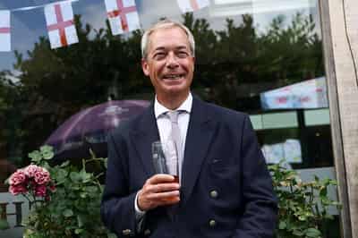 Image for UK police arrest man who threatened to shoot Nigel Farage, Telegraph says