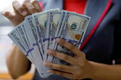 Image for Dollar holds firm ahead of U.S. durable goods, housing data
