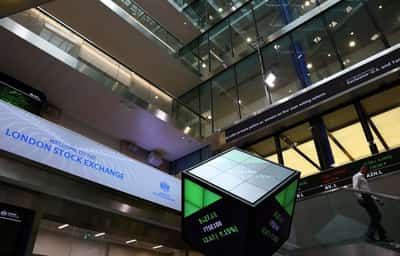 Image for UK stocks down for third day as mixed earnings weigh