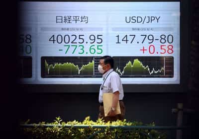 Image for World equities flat, crude oil prices fall as Trump, Putin hold high-stakes talks