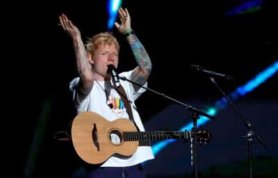 Image for Soccer-Sheeran keeps up England tradition with World Cup camp visit