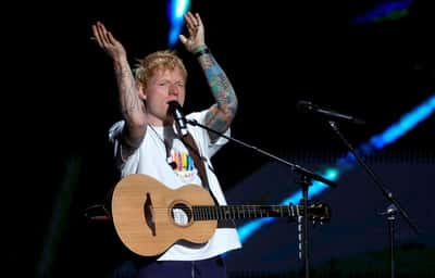 Image for Soccer-Sheeran keeps up England tradition with World Cup camp visit