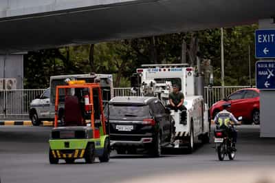 Image for Five-year-old girl among two dead in Manila airport car crash