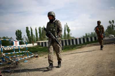 Image for Kashmir police name three militants behind tourists killing, say two are Pakistani