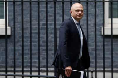 Image for UK minister apologises for urging people not to &#8216;cower from&#8217; COVID