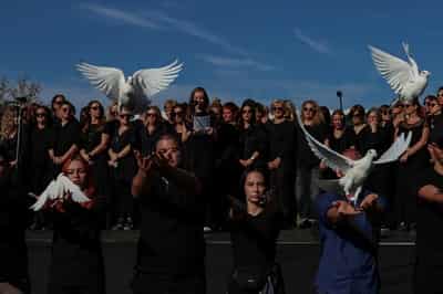 Image for Tens of thousands protest in Serbia on anniversary of deadly roof collapse